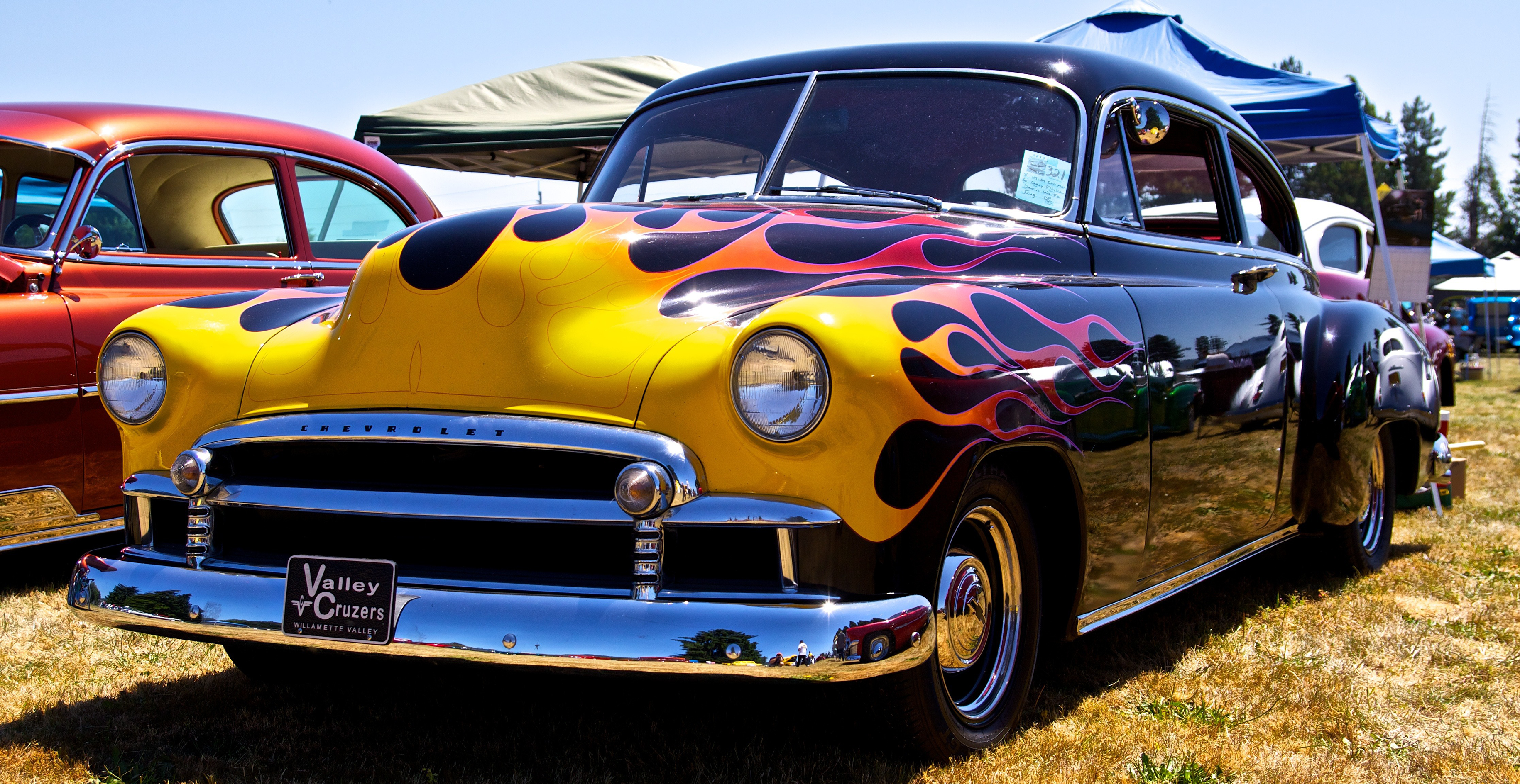 Black car with old school flames